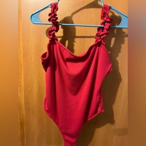red bodysuit